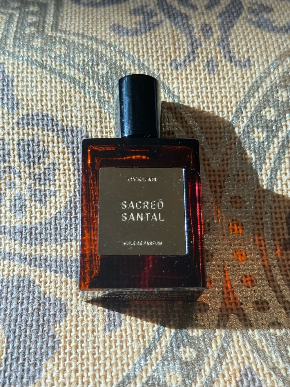 Sacred Santal Eau de Parfum with roller application